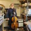 Mike Sheriff with a completed cello in his shop.